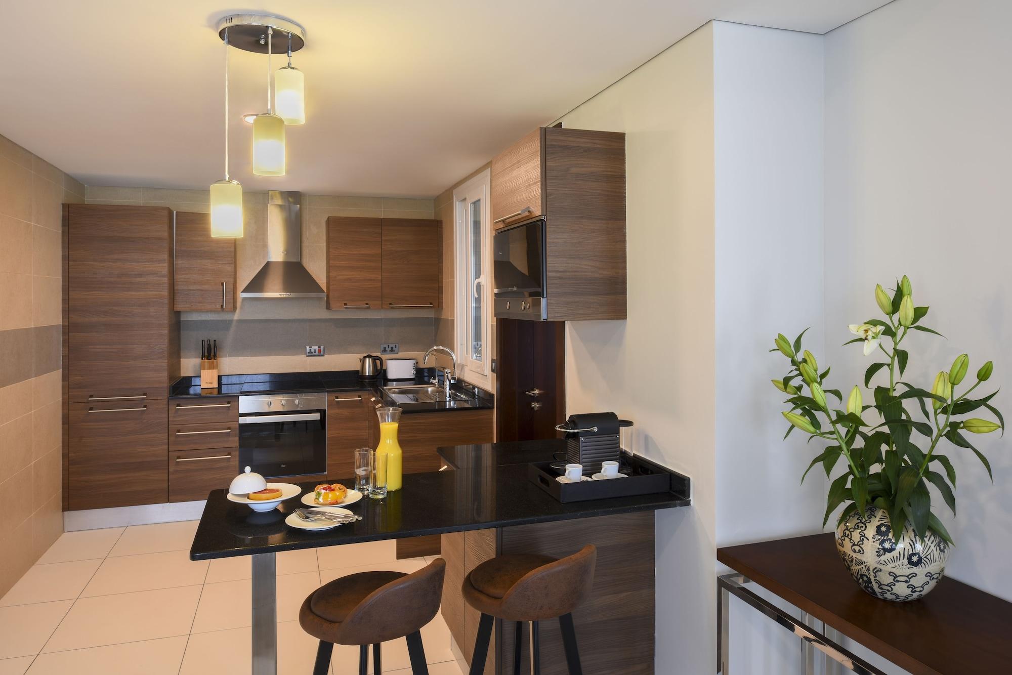 เฟรเซอร์ สวีท มัสกัต Hotel ภายนอก รูปภาพ A kitchen