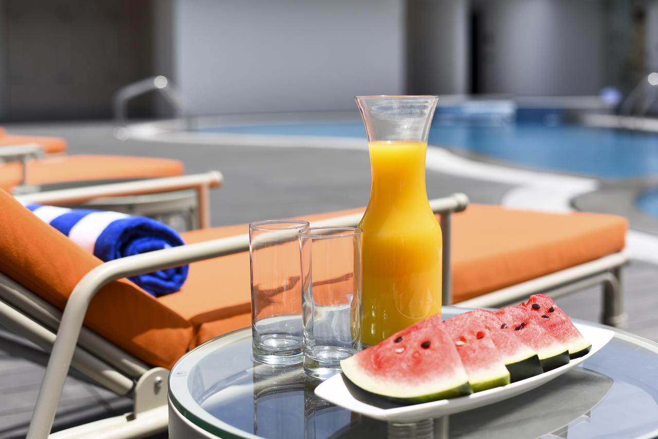 เฟรเซอร์ สวีท มัสกัต Hotel ภายนอก รูปภาพ A bottle of orange juice